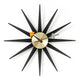 Vitra Sunburst Wall Clock in Black and Brass — packshot