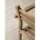 Carl Hansen AH502 Outdoor Dining Chair with Armrests in teak — lifestyle, detail