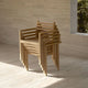 Carl Hansen AH502 Outdoor Dining Chair with Armrests in teak — lifestyle, stacked