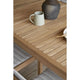 Carl Hansen AH902 Outdoor Dining Table Square in teak — lifestyle, with AH501 Outdoor Dining Chair, with cushions