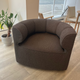audo eave seamline swivel lounge chair in brown fabric in innes gallery in hessle on oak floor
