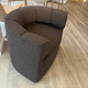 audo eave seamline swivel lounge chair in brown fabric in innes gallery in hessle on oak floor