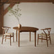 Carl Hansen CH337 Extendable Dining Table in Mahogany Oil — lifestyle, with CH24 Wishbone Chair