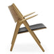 Carl Hansen CH28P Lounge Chair in Oak Oil, Black Leather — packshot, detail