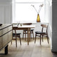 Carl Hansen CH30P Dining Chair in Walnut Oil — lifestyle, with CH327 Table