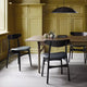 Carl Hansen CH30P Dining Chair in Oak Black Lacquer — lifestyle, with CH327 Table
