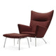 Carl Hansen CH446 Footrest in Balder 0533 — studio, with CH445 Wing Chair