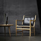 Carl Hansen CH44 Lounge Chair — lifestyle, with CH008 table