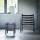 Carl Hansen CH53 Low Stool in Oak Black — lifestyle, with CH44 lounge chair