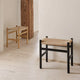 Carl Hansen CH53 Low Stool in Oak Oil — lifestyle, with CH53 in Oak Black