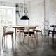 Carl Hansen CH33P Dining Chair in Oak Oil — lifestyle, with CH337 table