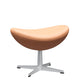 Fritz Hansen 3127 Egg Footstool in Natural leather with matt brushed base — packshot