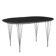 Fritz Hansen Superellipse Dining Table B611 in Black Fenix laminate with chrome legs — packshot