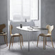 Fritz Hansen Superellipse Dining Table B612 in Fenix Laminate Black with ChromeLegs — lifestyle
