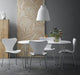 Fritz Hansen Superellipse Dining Table B612 in Fenix Laminate White with Chrome Legs — lifestyle