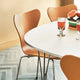 Fritz Hansen Superellipse Dining Table B611 in Fenix Laminate — lifestyle, detail