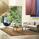 Fritz Hansen PK65 Square Coffee Table in Glass — lifestyle, with Egg Chair and Ro Sofa