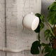 Flos Aim Suspension Light in White — lifestyle