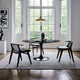 Knoll Saarinen Round Dining Table — lifestyle, dining room, with Knoll Klismos Chairs