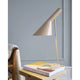 Louis Poulsen AJ Table Lamp Warm Sand lifestyle detail