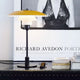 Louis Poulsen PH 3½-2½ Metal Table Lamp in Yellow — lifestyle