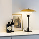 Louis Poulsen PH 3½-2½ Metal Table Lamp in Yellow — lifestyle