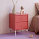 Montana Selection Drift Bedside Table in Rhubarb with snow legs — lifestyle