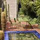 HAY Palissade Outdoor Dining Table Rectangular in Olive Green — lifestyle, with Palissade Bar Stool, Palissade Chair, Palissade Dining Bench
