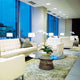 Knoll Platner Coffee Table in Polished Nickel with Clear Glass — lifestyle