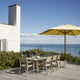 Skagerak Ballare Chair and Table with Messina Umbrella — lifestyle