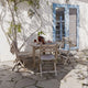Skagerak Selandia Outdoor Dining Chair and Selandia Table — lifestyle
