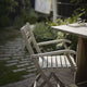 Skagerak Selandia Outdoor Dining Armchair — lifestyle