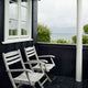Skagerak Selandia Outdoor Dining Armchair — lifestyle