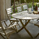 Skagerak Selandia Table 180×100cm and Selandia Outdoor Dining Armchair — lifestyle