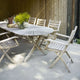 Skagerak Selandia Outdoor Dining Armchair and Selandia Table 180×100cm — lifestyle
