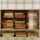 String System Display Cabinet in Oak (Clear Lacquer) — studio, with books