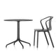 Vitra Belleville Bistro Table Outdoor Round in Deep Black — packshot, with Vitra Belleville Armchair Plastic in Deep Black