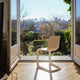 Vitra Evo-C Chair in Ivory — lifestyle, beside open garden doors