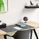 Vitra Repad in Black Natural — lifestyle, home office, with Vitra Cité Chair and Vitra Desk Clock