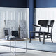 Carl Hansen CH22 Lounge Chair in Oak Black — lifestyle, with CH417 Tray Table