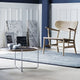 Carl Hansen CH417 Tray Table in Oak — lifestyle, with CH22 lounge chair