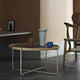 Carl Hansen CH417 Tray Table in Smoked Oak — lifestyle, with CH22 lounge chair